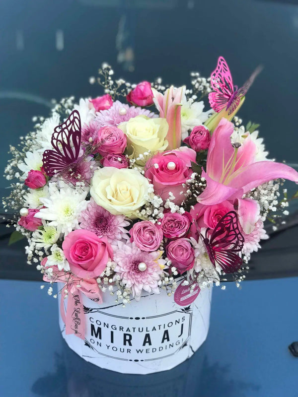 Custom printed flower box with roses and chrysanthemums for delivery in Islamabad Pakistan