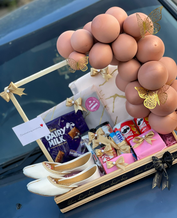 Luxury Eid gift basket for her with chocolates, stylish shoes, clothing and elegant jewelry