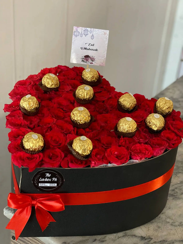 Heart-shaped Eid gift box with red roses and Ferrero Rocher chocolates in Islamabad