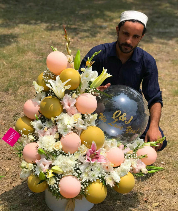Personalized wedding balloon and fresh flower bouquet for newlyweds