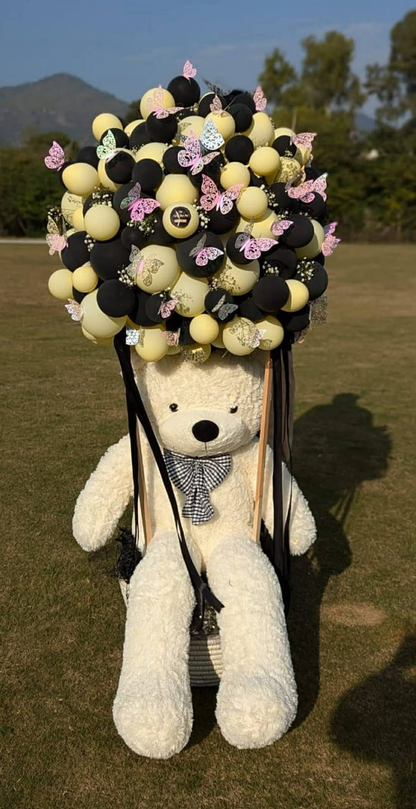 Grande luxury teddy bear in transparent balloon box and decorative gift basket in Islamabad