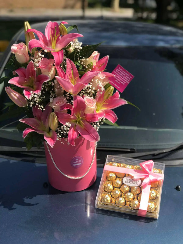 Elegant fresh lily and Ferrero Rocher chocolate gift box in Islamabad