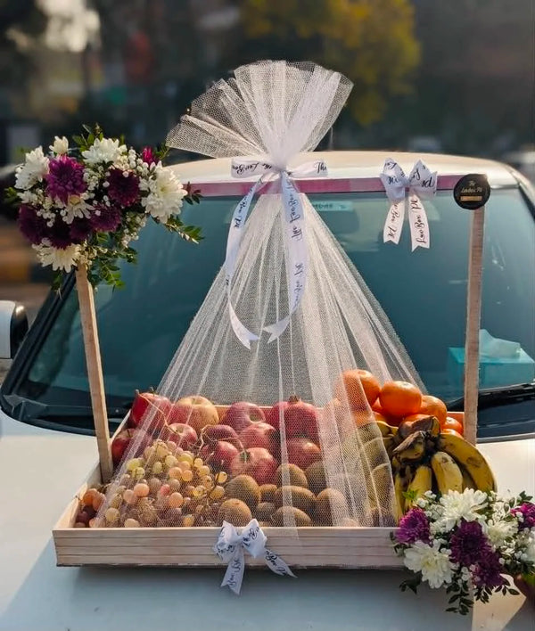 Luxury wedding fruit and flower basket with 6–8 kg seasonal fruits and elegant floral decoration in Islamabad