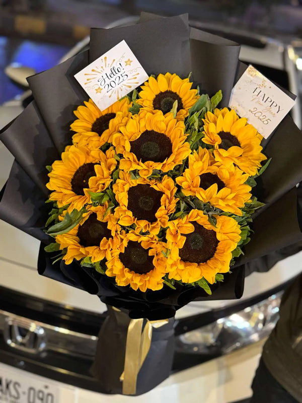Bright sunflower bouquet with fresh yellow blooms and elegant premium wrapping