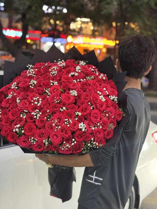 Oversized luxury red rose bouquet for her with long-stem roses in Islamabad